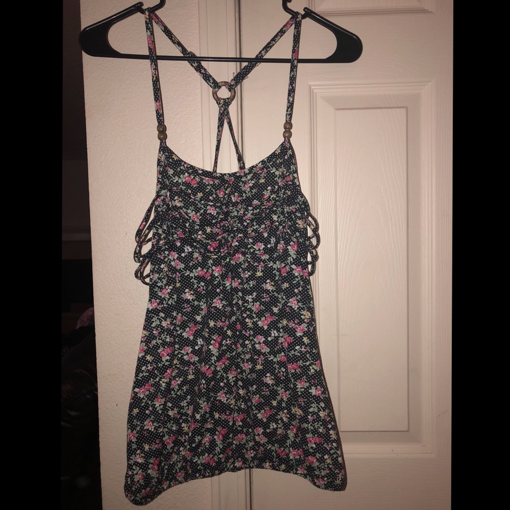 Black print tank top with cross cross on back